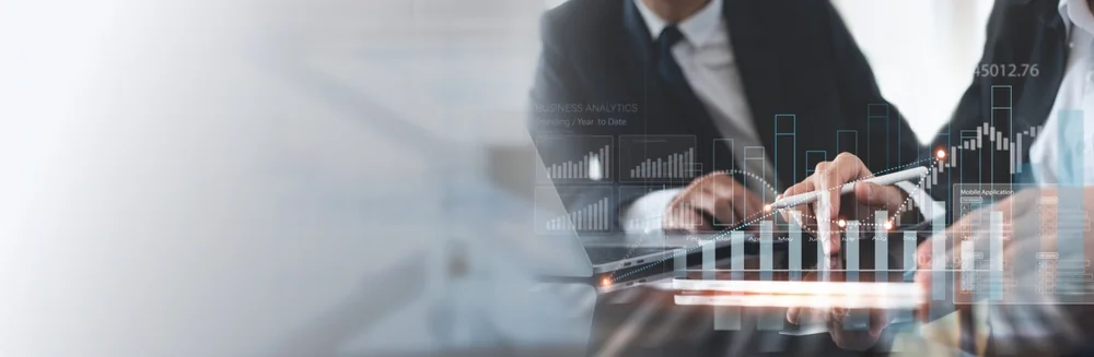 Consultant reviewing business analytics on a tablet