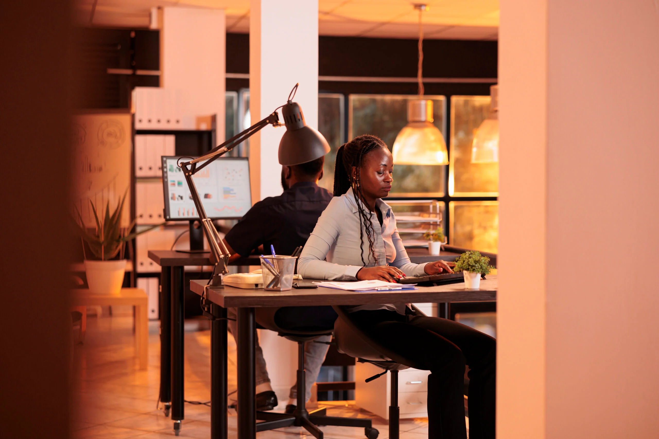 PSO Consults team members working together at a desk